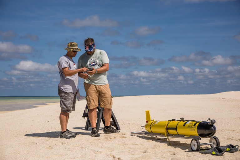Scientists Angelos Mallios and Rich Camilli calibrate the compass of an AUV glider. 
