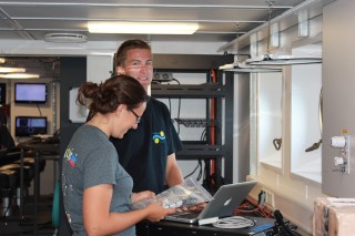 Interns working together, Julianna Diehl and Brandon D'Andrea complete inventory on the ROV equipment. 