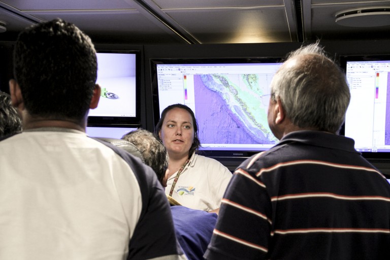 Lead Marine Technician Colleen Peters trains Dr Singh and fellow experts on the visual matrix.