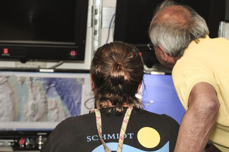 Lead Marine Technician Colleen Peters and Doctor Satish Singh analyze previous data from the area.
