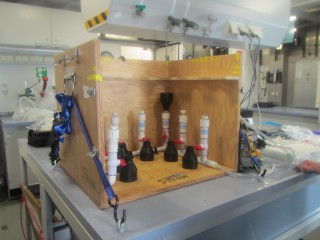 Pete Strutton’s setup for filtering ocean water samples is strapped down in the wet lab. 