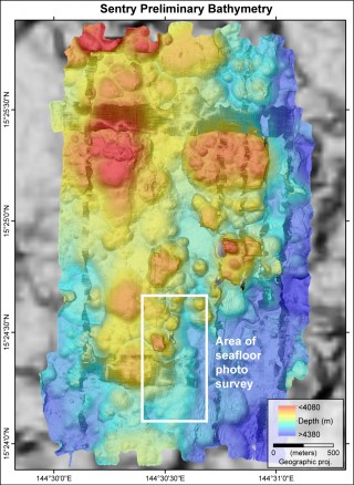 Preliminary AUV Sentry multibeam data in the area of low-temperature venting discovered during CTD tow 6. Sentry seafloor bathymetry data resolution is 1 meter. The white box shows the area of the Sentry photo survey that captured the new lava flows.