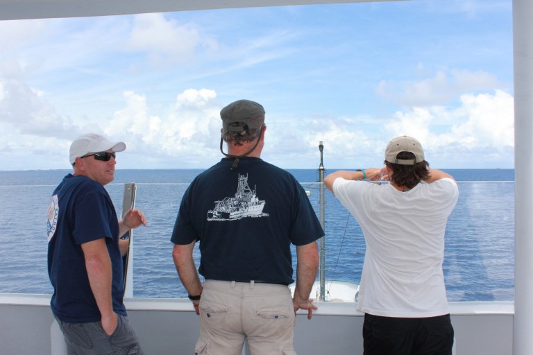 The science team looks at the horizon as Falkor travels to the first sample spot. They are eager for data to help fill the models and provide the answers they are looking for. 