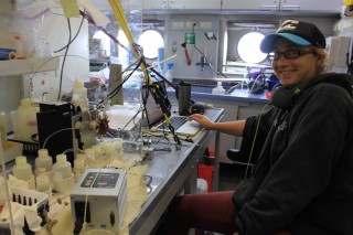 University of Hawaii graduate student Gabrielle Weiss works in the wet lab trying to callibrate her seawater injection analysis instrument.