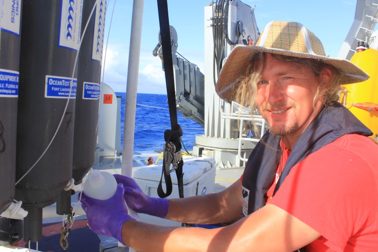 University of Hawaii post doctroal fellow Arne Sturm collectes seawater for Iron analysis. 