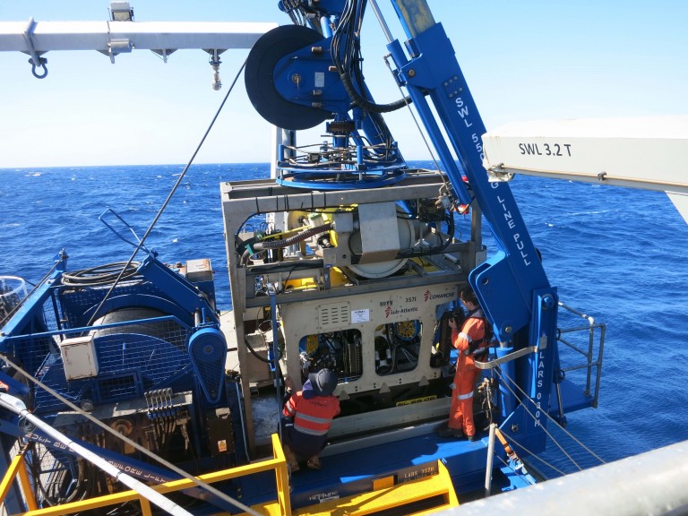 The ROV stationed on the Launch And Recovery System (LARS) aboard Falkor; getting prepped by technicians for the first test dive in the Perth Canyon. 