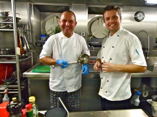 Two much-loved chefs in the galley (head chef Grzegorz Kuberski, left, and chef Carlos Waihrich, right).