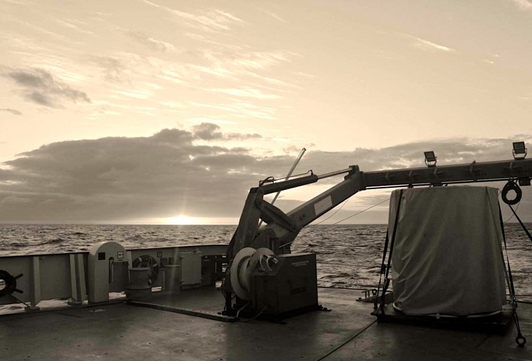 A view of the aft deck at sunrise.