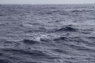 "Your typical South Pacific weather" - The weather so far has produced rolling seas, including choppy waves and whitecaps. 