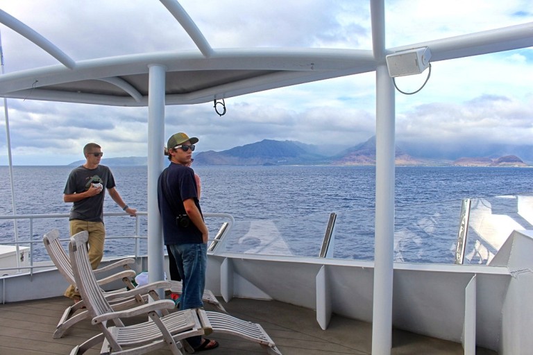 Students take a break on the observation deck to enjoy the view of Kaena Point.