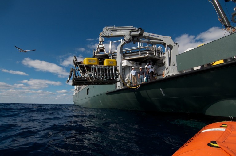 ROV Global Explorer is lifted out of the water onto R/V Falkor after servicing a benthic lander on the seafloor 1,500 meters below.