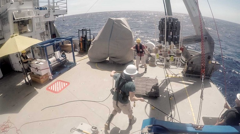 The team deploys the TMR (Trace Metal Rosette) from R/V Falkor’s aft deck.