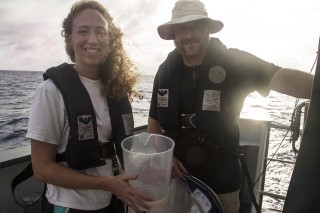 Erin McParland and Eric Webb after collecting plankton by towing a net at R/V Falkor’s aft deck.