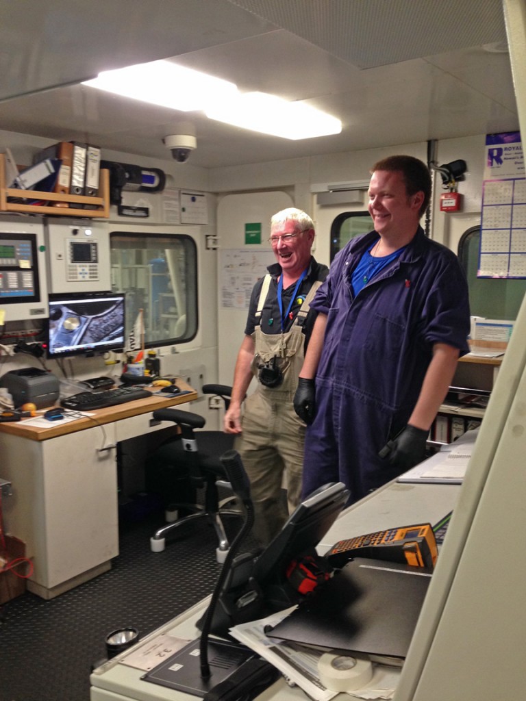 Chief Engineer Allan Watts (left) and 2nd Engineer Douglas Hay (right) showcasing the engine room. 