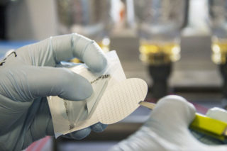 Scientists onboard of Falkor filter water samples in order to collect organic and inorganic materials. The filters are preserved and brought back ashore for later analysis in the lab.