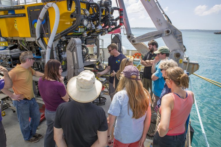 Lead mechanical engineer Jason Williams introduces the science team to their new best friend ROV SuBastian in Guam.