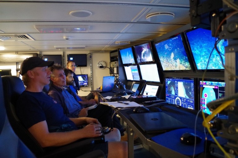 ROV team conducting transects from the science control room.