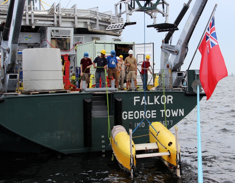 Nereus being lowered gently into the water for the first dip of the cruise.