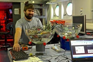 David Barclay, preparing one of the Deep Sound instrument housings for a dive.