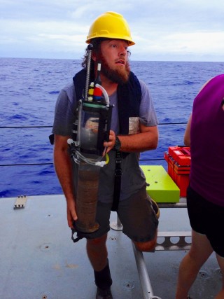 Postdoctoral Researcher Clif Nunnally, removes a core from the FVCR for transport to the cold van where it will be processed.