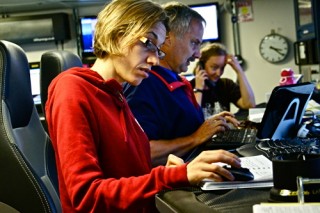 Stephanie Waterman, Richard Dewey, and Brianna Cerkiewicz (left to right) hard at work in the control room.