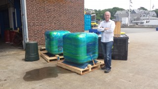 Landers project manager David Wotherspoon with the special syntactic foam ready to be shaped into floats for the landers. 