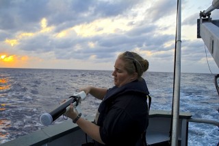 Marine technician Deb Smith, preparing to launch the XBT probe.