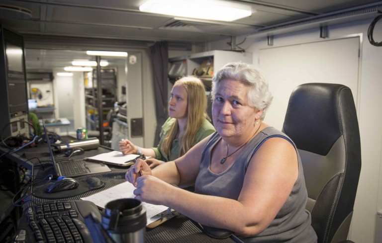 Sharon Walker and Melissa Anderson in the Science Control room on R/V Falkor. 