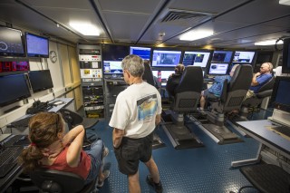 The science control room on R/V Falkor where scientists monitor sensor from towed instrument packages during their hunt for new hydrothermal vents in the Mariana back-arc.