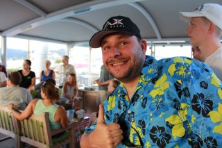 SOI marine technician and cruise coordinator Leighton Rolley gives the welcome barbeque food a big thumbs up. 