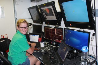 Sentry engineer Johanna Hansen runs a practice test that sends faux obstacles and targets to AUV Sentry on the Aft deck.