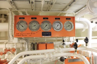 Five of the dozens of pressure gauges that can be found in the engine room. 