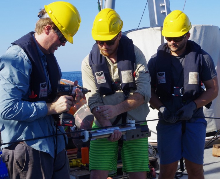 Instruments to measure water temperature and water level are attached to a mooring wire.