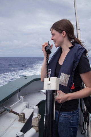 Science crew Jennifer Neale prepares to launch an XBT (ependable bathythermograph).