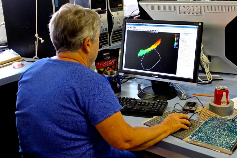 Joyce Miller processing sonar data.