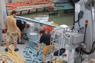 OI R/V Falkor crew working hard to tie up lines upon arrival in Honolulu. 