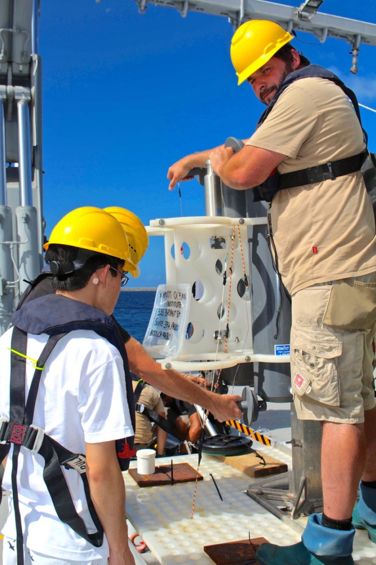 Than Kyaw (L) and Leighton Rolley (R) prepping SOI's "Lollipop" lander for deployment.