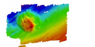 This is a bathymetric map of a seamount made on Falkor specifically for the lander deployments on this expedition. The peak of the seamount (dark red) is at about 7,500 meters.