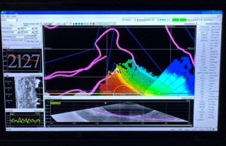A view of the Seafloor Information System screen from the sonar system. This is the main screen the team has to monitor 24 hours per day during mapping.