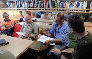 Science team meeting in the library (picturing Simon Spagnol, Greg Ivey, Richard Brinkman and Andrew Heyward).