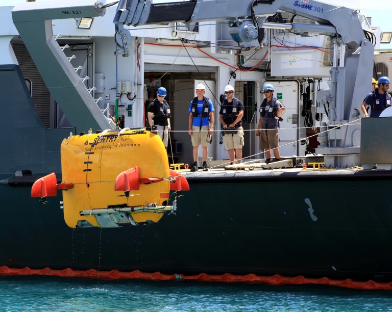 WHOI's Sentry team and SOI crew practice deploying the AUV Sentry off the aft deck of Falkor. 