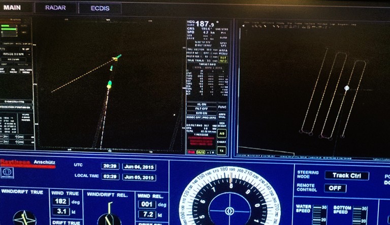 Screens show a rogue fishing boat headed towards R/V FALKOR and her instruments.